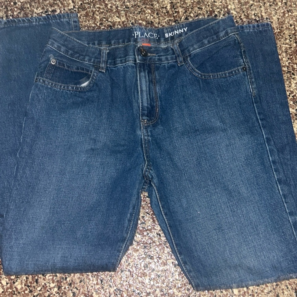 Blue size 14 skinny jeans children place. Like new